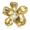Sculpted Flower Brooch in Metal with Smooth Curled Metal Petals Around a White Pearl view 1