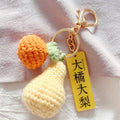 Crocheted Fruit Keychain Set with Bells and Gold Tone Hardware view 4