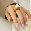 Gold And Steel Angular Band Rings With Large White Pearl view 6
