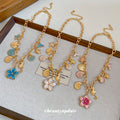 Gold Tone Ocean Charm and Flower Chain Necklaces Statement Jewelry view 2