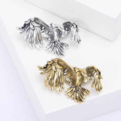 Product image 1 showing the spread wing eagle brooch in antique silver or gold.