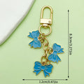 Three Bow Charm Keychain in Red or Blue with Gold Tone Clasp view 6