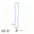 Round Bead Necklaces With Three Gold And Cream Strawberry Pendants view 8