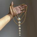 Layered Gold Tone Chain Necklace With Long Graduated Pearl Drop view 3