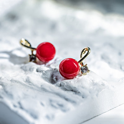 Primary supplied view of red bean stud earrings