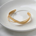 Matte Gold Tone Crossing Ribbon Open Cuff Bracelet view 6