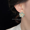 Mint Enamel Camellia Flower Stud Earrings Gold Rim CZ view 2