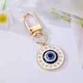 Gold Tone Enamel Lash and Crystal Evil Eye Clip Keychains view 3