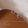 Silver Tone Clear Stone Openwork Stud Earrings With Aqua Accents view 4