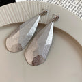 Faceted Teardrop Metal Earrings in Four Gold and Silver Finishes view 8