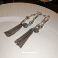 Antique Silver Tone Ball and Tassel Drop Earrings with Polished Metal Accents view 2
