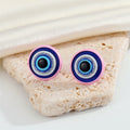 Round Blue Evil Eye Stud Earrings with Six Colored Metal Rims view 3
