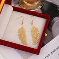 Gold Black Rose Gold and Silver Open Feather Hook Earrings view 1