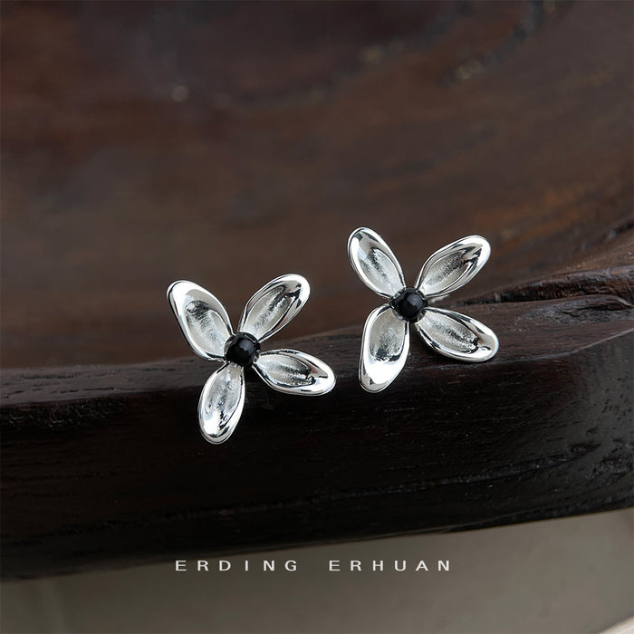 Silver Tone Clear Four Petal Flower And Black Center Stud Earrings