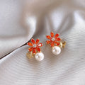 Gold Orange Crystal Flower And Pearl Stud Earrings view 1