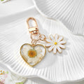 Gold Tone Daisy and Pressed Flower Heart Snap-Hook Keychains in Ten Options view 3