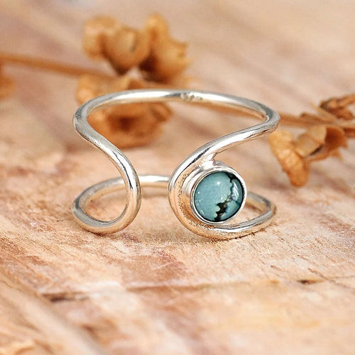 Image 2 showing blue round stone open ring