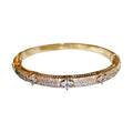 Raised Flower Crystal Hinged Bangle In Gold Tone Or Silver Tone view 5