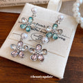 Pearl And Crystal Flower Drop Earrings With Polished Metal Details view 2