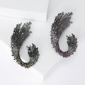 Gunmetal Rhinestone Wave Plume Brooch Purple Green Accents view 1