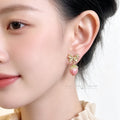 Gold Tone Bow And Pink Strawberry Resin Drop Stud Earrings view 2
