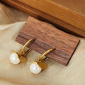Gold Hoop Earrings White Pearl Curved Metal Disc Drop view 3