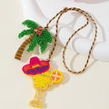 Beaded Cocktail Glass And Palm Tree Pendant On Braided Cord view 3
