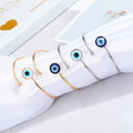 Blue and White Evil Eye Open Cuff Bracelets in Eight Finish Options view 3