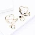 Gold Tone Heart Stethoscope Brooch In White And Black view 3