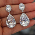 White Gold Teardrop Halo Clear Drop Cubic Zirconia Earrings view 3