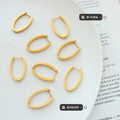 Flat Oval Huggie Hoop Earrings Gold And Steel Tone Metal view 2