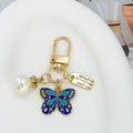 Gold Tone Crystal Charm Keychain With Faux Pearl Pendant view 11