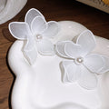 Sheer Petal Flower Stud Earrings with Pearl Centers view 10