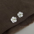 Silver Camellia Flower Stud Earrings Green Center Stone view 4
