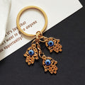 Triple Hamsa Hand Blue Evil Eye Keychain in Gold Tone Metal view 3