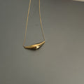 Polished Curved Bar Pendant Necklace in Gold and Silver Tones view 6
