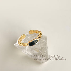 Gold Open Adjustable Ring Black Oval Inlay Twisted Band