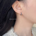 Silver Huggie Hoop Earrings Black Heart Enamel Accents view 2