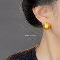 Matte Gold Tone Round Ball Stud Earrings In Five Graduated Sizes view 2