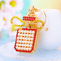 Pearl Bow Perfume Bottle Keychains in Three Colors plus Assorted Option view 1