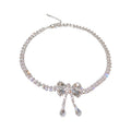 Silver Tone Crystal Bow Drop Earrings Or Matching Necklace view 5