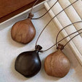 Wood Look Vessel Pendant Necklace On Brown Cord Jewelry Design view 2
