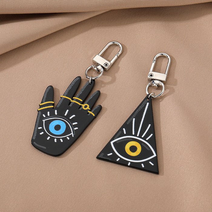 Silver Tone Black Triangle and Hamsa Eye Clip Keychains