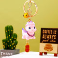 Pink Baby Dragon Keychains in Fortune Tag Ingot and Standing Designs view 3