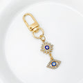 Gold-Tone Rhinestone Flower Evil Eye Charm Bag Keychain view 6