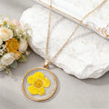 Gold Tone Round Pressed Flower Pendant Necklaces in Fourteen Designs view 2