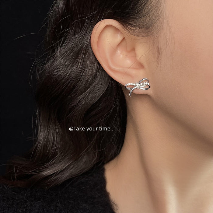 Pave Bow Stud Earrings Silver and Rose Gold Metal Alloy