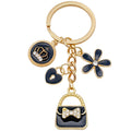 Five Fashion Handbag Lipstick and Crown Metal Keychain Designs view 5