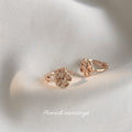Rose Gold Five Petal Flower Huggie Hoop Earrings Pair view 4