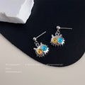 Silver Tone Spiky Cat Face Drop Earrings Mismatched Eyes view 1